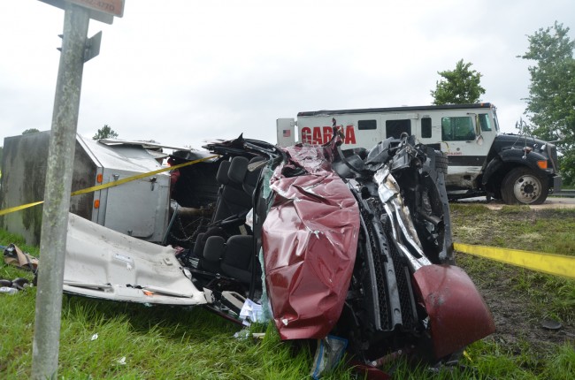 The remains of the pick-up truck, after its driver, an elderly woman, was extracted. Click on the image for larger view. (c FlaglerLive)