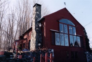 MacGregor Burns's red barn and home in Williamstown. Click on the image for larger view. (© FlaglerLive)