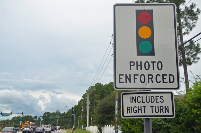 That right-turn part, seen here at a sign on Belle Terre in Palm Coast, may soon be declared unenforceable by the Florida Legislature. (? FlaglerLive)