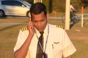 Raul d'Souza, a new Sully Sullenberger, immediately after the landing. Click on the image for larger view. (© FlaglerLive)