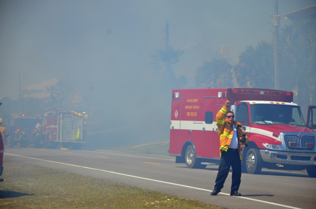 Flagler County Fire Chief Don Petito commanding fire trucks arriving at the Beverly Beach scene this afternoon. (c FlaglerLive)