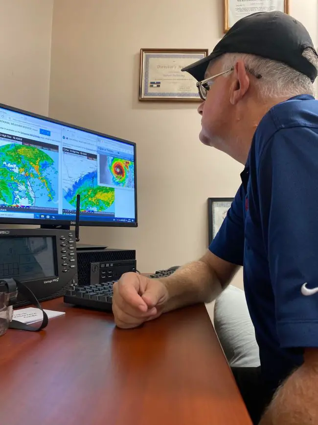 Flagler County Emergency Management's Bob Pickering, the weather specialist, analyzing data ahead of his latest updates today at the Emergency Operations Center. 