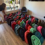 Some of the 96 fully-stocked backpacks. (HBA)