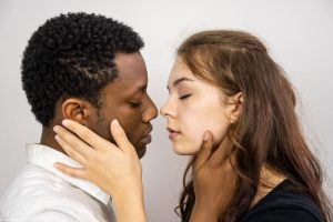 Brent Jordan is Tom and Nikki Lynn is Amber in City Repertory Theatre’s production of “Actually,” a play about a young black man and a young white woman  who become mired in a he said/she said, was-it-date-rape scenario. Photo by Mike Kitaif