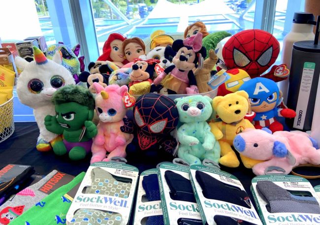 Baby Hulk, Baby Spider-man, unicorns and their pals sit in the temporary giftshop of AdventHealth Palm Coast Parkway. (© FlaglerLive)