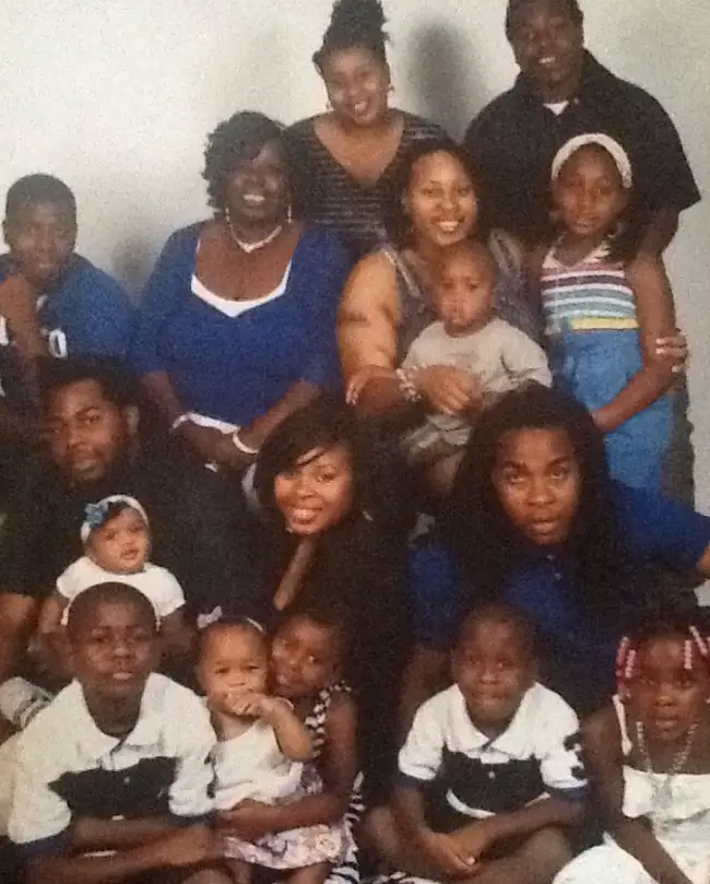 Alicia Fennell, in blue toward left of center, with her children and grandchildren. Click on the image for larger view. (Jerail Fennell)