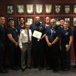 Flagler Chapter of the Sons of the American Revolution President Charles Hayes and Dr. Jeff Schaller, present the 2019 Fire Service Medal & Certificate to Palm Coast Fire Capt. James Neuenfeldt. Pictured is Deputy Chief Bradd Clark and Palm Coast firefighters.