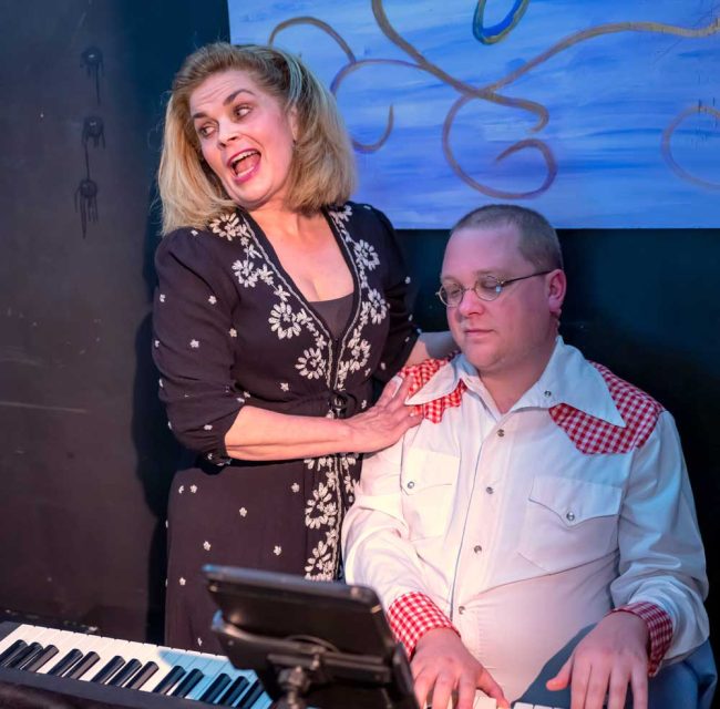 Robin Neill-Kitaif is Angela and Ben Beck is the piano player in the City Repertory Theatre’s production of “Honky Tonk Angels.” (© Mike Kitaif