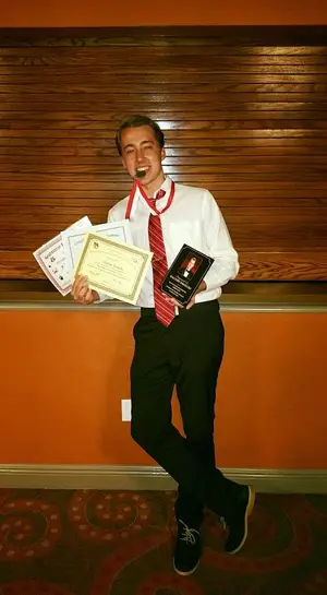 Dalton, seen here with his awards, graduates Friday. (Cindy Dalecki)