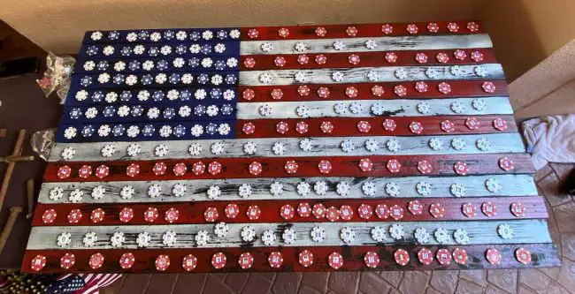 The flag with 353 chips, each with a picture of one of the firefighters lost on 9/11. (Flagler County)