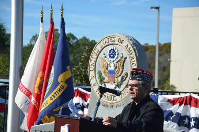 County Commission Chairman George Hanns, an Army sergeant, was master of ceremonies at today's commemoration of Veterans Day. (© FlaglerLive)