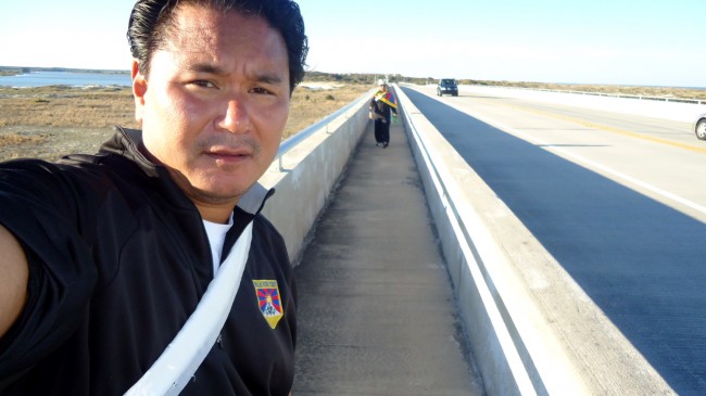 Jogme Norbu, in his last self-portrait a few hours before he was killed, with fellow-walker Wangchuk Dorjee in the distance.