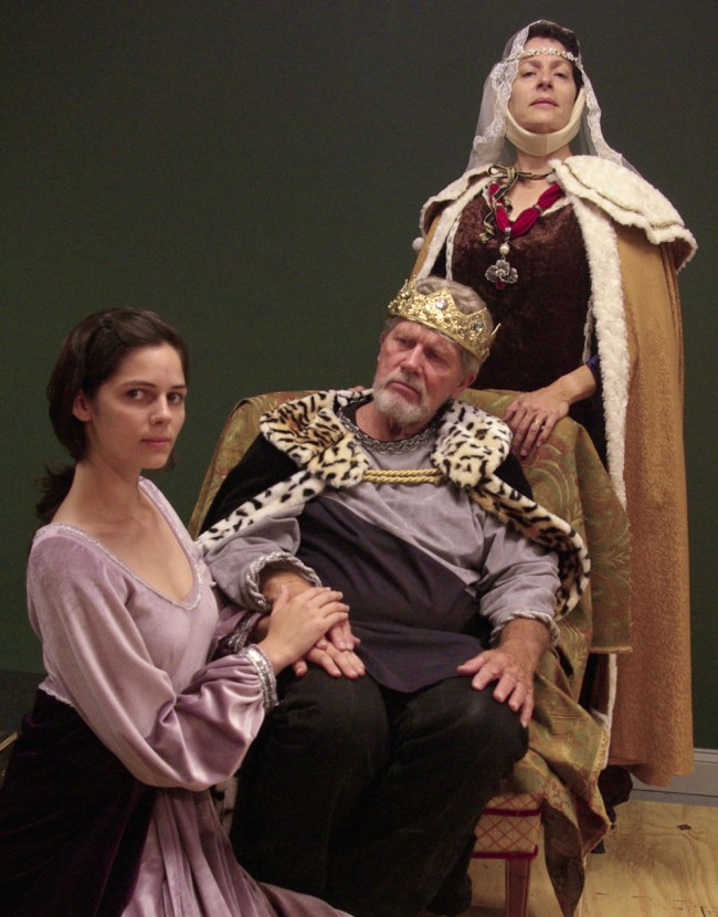 John Pope's Henry II is flanked by his mistress Alais (Kaylee Rotunno, kneeling) and his wife Eleanor of Aquitaine (Julia Davidson Truilo) in John Sbordone's production of 'The Lion in Winter,' at Palm Coast's City Repertory Theatre. The play, running this weekend and next, ends the company's second season.