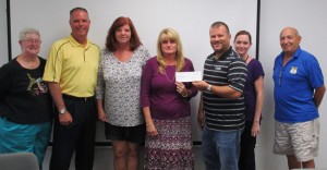 PAL executive board members are from left: Donna Gernert; Flagler Beach Police Capt. Matt Doughney; Becky Mitchell; Kim Hale; Ken Moscone; Theresa Shaw and Ray Ruggieri. Not shown are Bunnell Police Chief Tom Foster; and Flagler County Sheriff’s Office Senior Commander Steve Cole