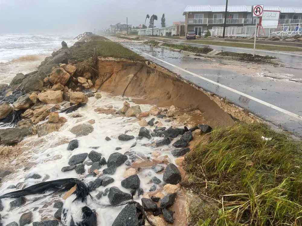 State Road A1A in Flagler Beach again sustained heavy damage and was expected to be closed in parts, including at the south end of the county, where damage was similarly heavy. (© Rick Belhumeur for FlaglerLive)