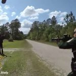 Aaron Thayer moments before he is tased at the edge of his father's property in the Mondex, or Daytona North, Saturday, in a still from body camera footage.