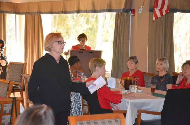 Elinor Bozzone presenting the new scholarship in Mary Ann Clark's name at last Saturday's meeting of the AAUW Flagler branch. (© FlaglerLive)