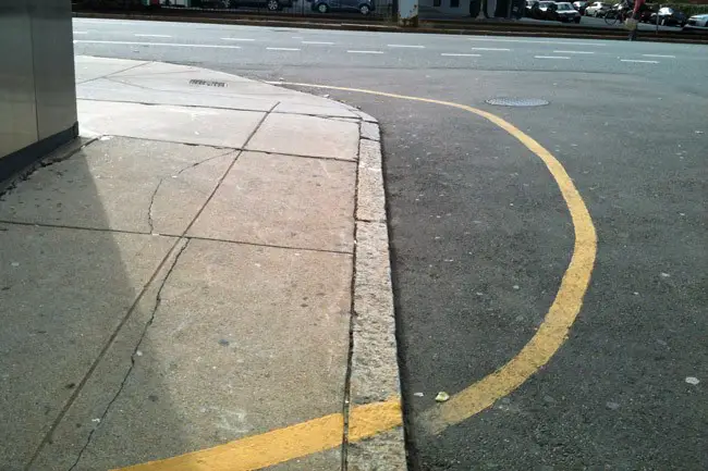 The yellow line, designed to protect against harassment,  indicates the area that people must pass through without stopping, unless they're going into a health center that provides abortion.  (Kim Brookes)