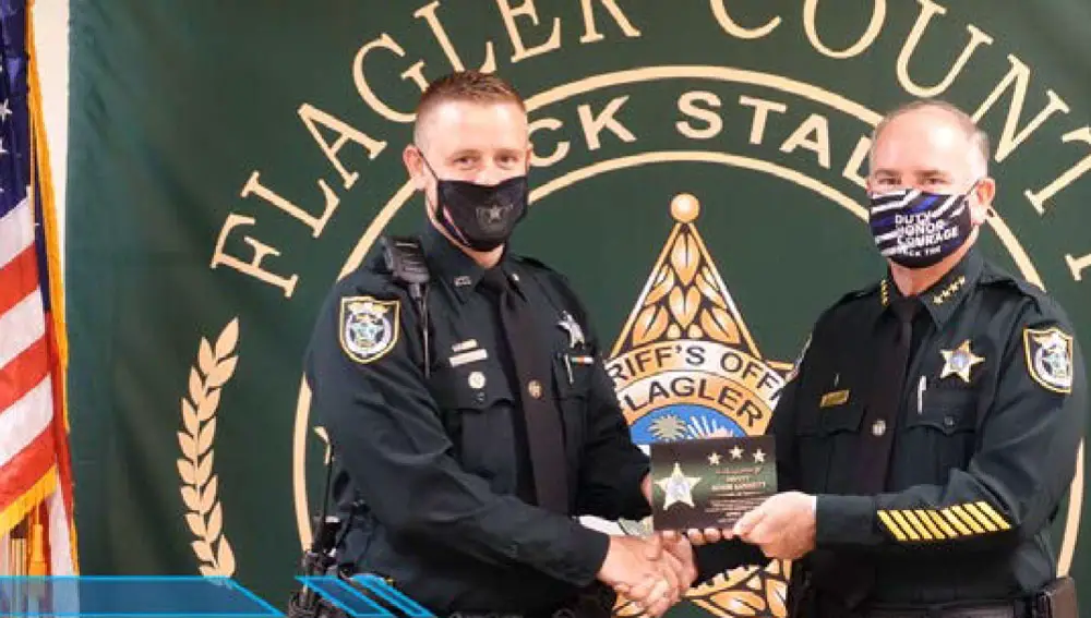April Employee of the Month Deputy Adam Gossett with Sheriff Rick Staly. (FCSO)