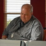 Do I really want to do this? Adam Mengle is the interim assistant county administrator. (© FlaglerLive)