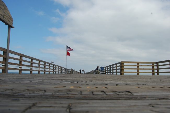 The pier's engraved deck boards have a hold on a lot of local residents. (© FlaglerLive)