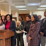 House Democratic Leader Fentrice Driskell stands among the bicameral Democratic caucus, setting forward its agenda for the 2026 legislative session on Dec. 8, 2025. (Photo by Jay Waagmeester/Florida Phoenix)