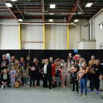 Newly arrived South Africans in a hangar at Atlantic Aviation Dulles near
