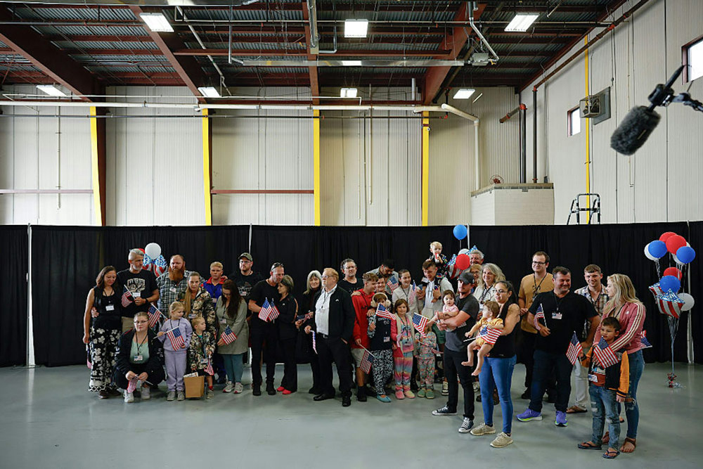 Newly arrived South Africans in a hangar at Atlantic Aviation Dulles near