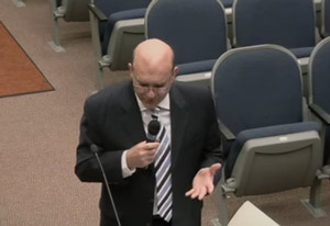 County Attorney Al Hadeed led the series of four public hearings culminating in Monday's unanimous vote by the county commission to approve the customary-use ordinance. (© FlaglerLive via Flagler County TV)
