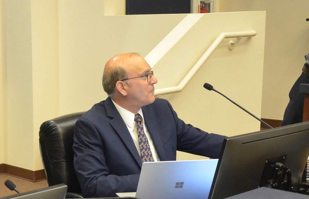 County Attorney Al Hadeed, from where he usually sits during commission meetings. (© FlaglerLive)