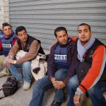 Al Jazeera's Gaza crew and other journalists out on the street following concerns that their media building could be hit by the Israeli military--in 2008. Then as now, journalists' fears have been justified. (Wikimedia Commons)