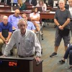 Alan Petersen, who had been a Palm Coast City Council member when the panel last voted itself a raise in 2007, addressing the panel in opposition to a much bigger raise proposal this morning. (© FlaglerLive via YouTube)