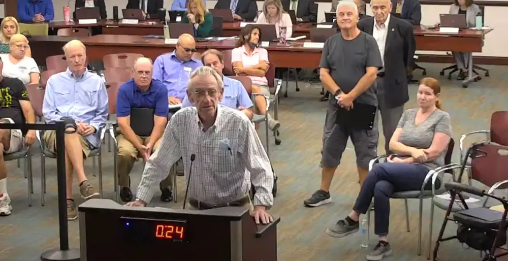 Alan Petersen, who had been a Palm Coast City Council member when the panel last voted itself a raise in 2007, addressing the panel in opposition to a much bigger raise proposal this morning. (© FlaglerLive via YouTube)