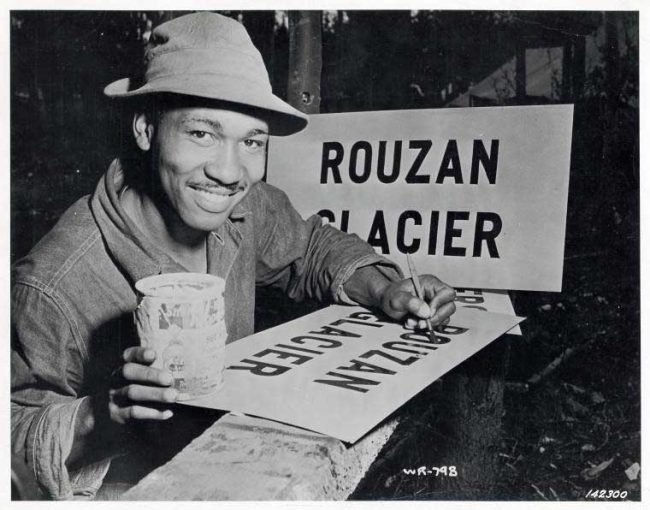 An unidentified Alaska Highway serviceman working with the U.S. Army Corps of Engineers' project in 1942. A third of the men who worked on the highway were Black. (NYPL Digital Collection)