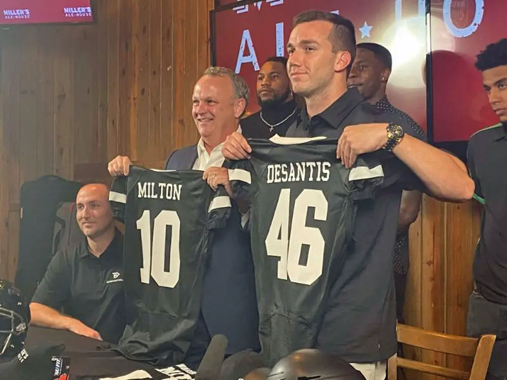 On Thursday, Florida State University quarterback McKenzie Milton appeared at a Miller’s Ale House restaurant in Tallahassee to sign a contract with Dreamfield, a company he co-founded with University of Miami quarterback D’Eriq King. (NSF)