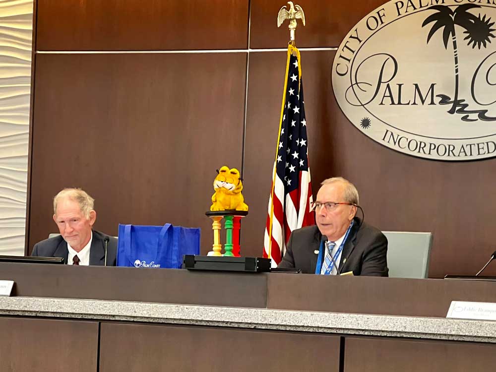 Bill Reischmann, the city's lpong-0time attorney, may have thought he'd seen everything in a city that keeps disabusing him. Today, after invoking the name of Ronald Reagan, Palm Coast Mayor propped up Garfield, the cynical and lazy character, to make a point about preservation of Palm Coast's quality of life. The city issued the image to media, along with Alfin's complete speech.