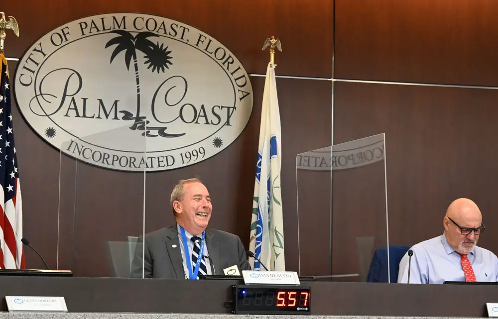 Palm Coast Mayor David Alfin, left, and Council member Eddie Branquinho have been at odds over the mayor's proposed quadrupling of council members' salaries. (© FlaglerLive)