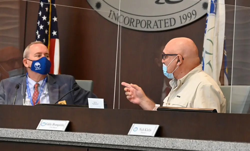 Mayor David Alfin, left, and Council member Eddie Branquinho see funding policing and and the tax rate differently this year. (© FlaglerLive)