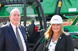 Palm Coast Mayor David Alfin and County Administrator Heidi Petito, seen here when they took part in the filming of what will be the virtual groundbreaking of AdventHealth Palm Coast's new hospital on Palm Coast Parkway. They both appear in a public service announcement urging Covid safety and vaccination. (© FlaglerLive)