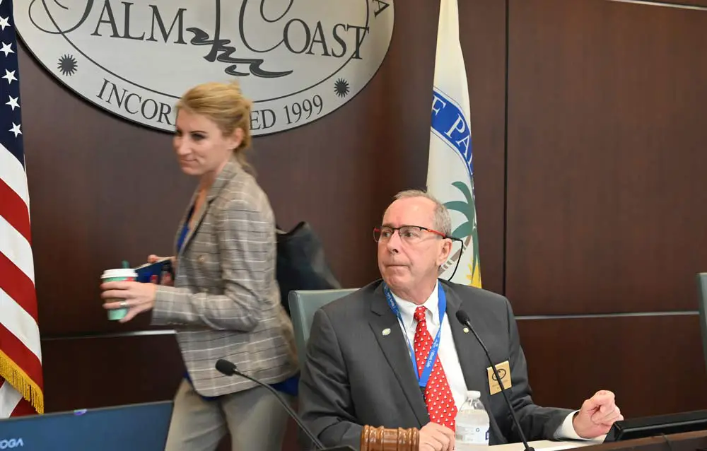 Palm Coast Mayor David Alfin and Council member Theresa Pontieri do not see eye to eye on the pace of development in Palm Coast. (© FlaglerLive)