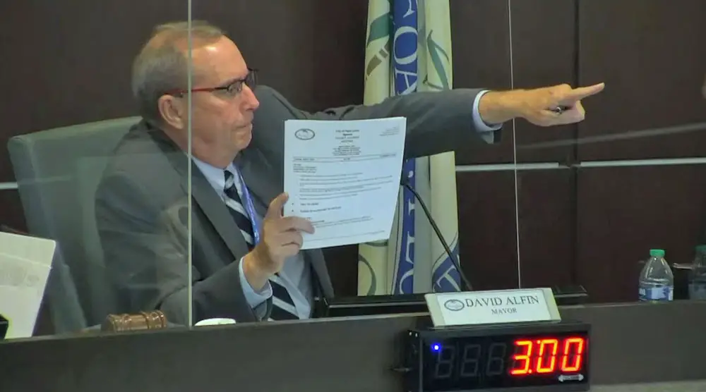 Palm Coast Mayor David Alfin tonight won a major victory, at least for now, in getting three other votes to raise council members' salaries and that of the mayor, starting after November. (© FlaglerLive via YouTube)