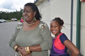 Alicia Fennell and her granddaughter Leon’ntashia Leggette, 8, who played a big role in the rescue. Click on the image for larger view. (© FlaglerLive)