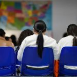 Asylum seekers wait at Catholic Charities in McAllen, Texas, for humanitarian aid on Jan. 18, 2025.