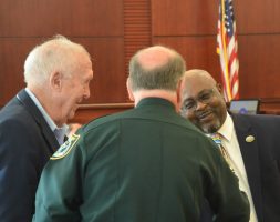 Bunnell City Manager Alvin jackson, right, with Sheriff Rick Staly and County Commissioner Charlie Ericksen earlier today, before a drug court graduation ceremony at the Flagler County courthouse. (© FlaglerLive)