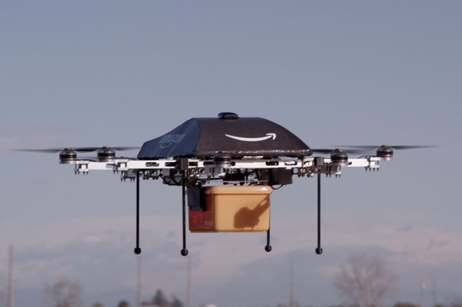 A drone on its way to deliver an Amazon Prime Air package, as shown in an Amazon publicity shot. 