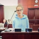 Angel SExton at her sentencing this morning. (© FlaglerLive via zoom)