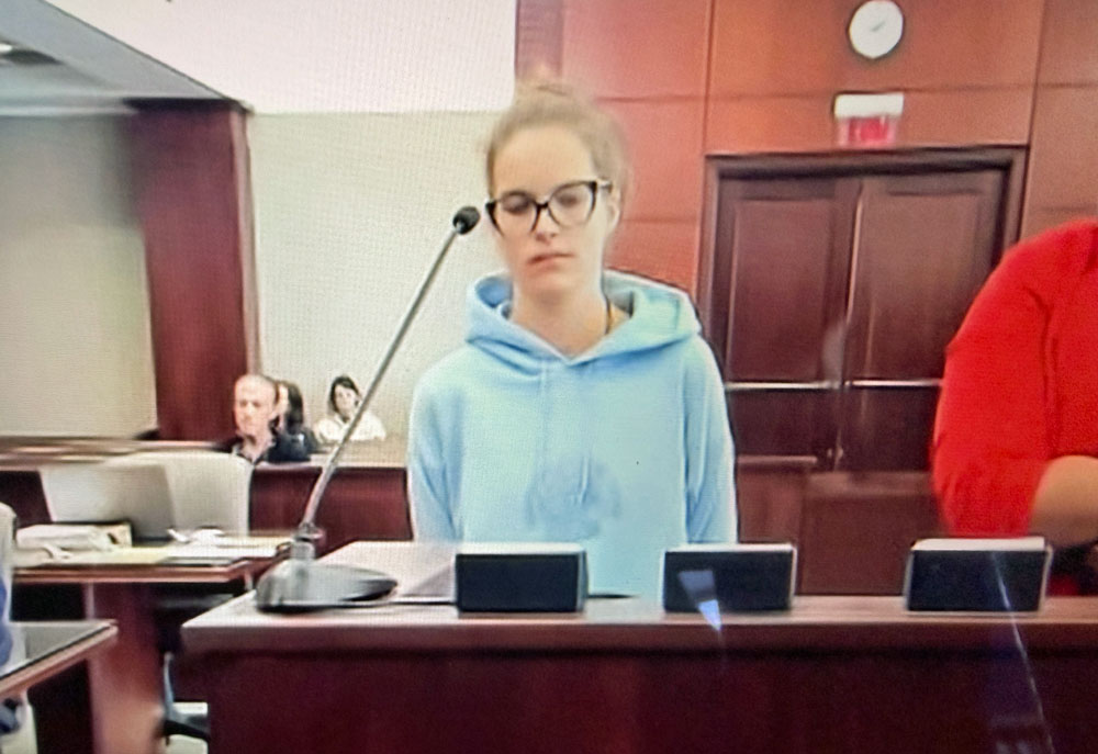 Angel SExton at her sentencing this morning. (© FlaglerLive via zoom)