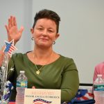 Angela TenBroeck at a Meet the Mayors forum hosted by the Flagler County Association of Realtors last May, flanked by Bunnell Mayor Catherine Robinson, right, and Flagler Beach Mayor Patti King. (© FlaglerLive)