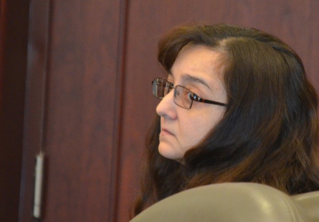 Angela Wray this afternoon, moments before she heard the judge sentence her to three years in prison. (© FlaglerLive)