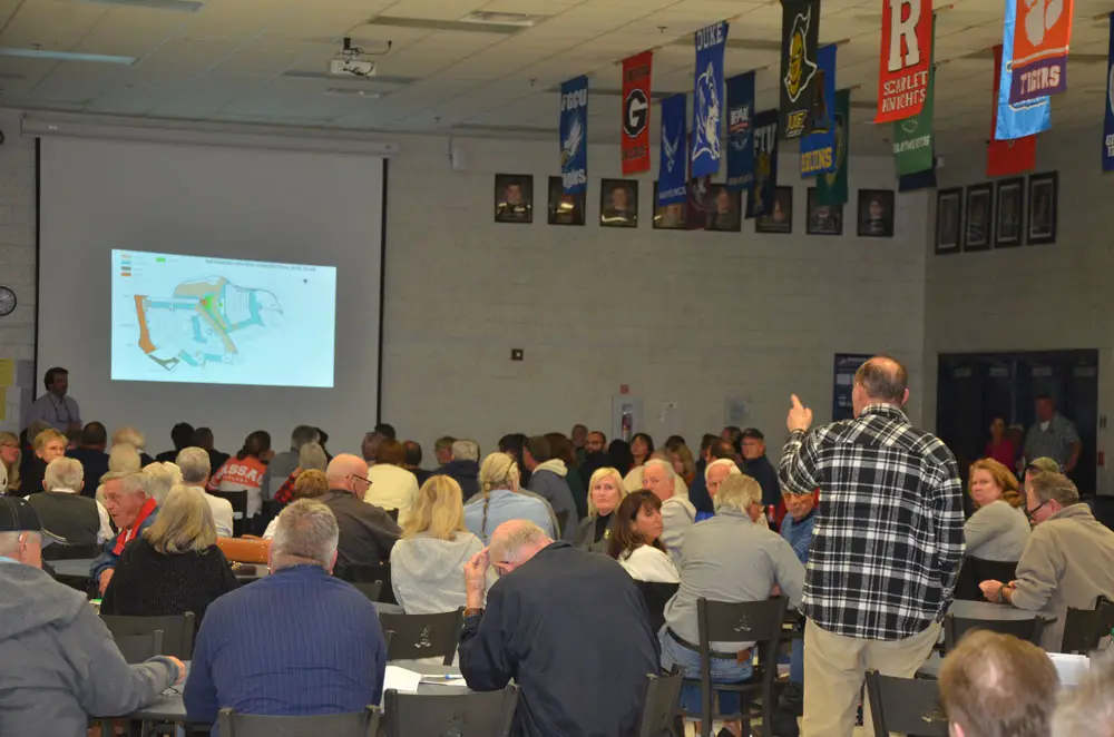 There was some public anger, a lot of skepticism and plenty of anxiety Thursday evening at Matanzas High School, at a community meeting organized by the developer of a proposed development along the Matanzas gold course in North Palm Coast. (© FlaglerLive)